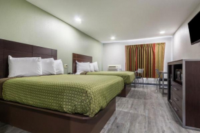 Гостиница Scottish Inn and Suites Tomball  Томбал